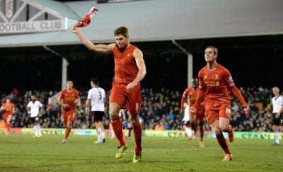 STEVEN GERRARD TAKING HIS TOP OFF AFTER ONE OF HIS GOALS. Pic: David Rawcliffe-Propaganda.